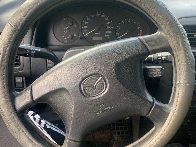 Синий Мазда 626, объемом двигателя 2 л и пробегом 3 тыс. км за 1900 $, фото 8 на Automoto.ua