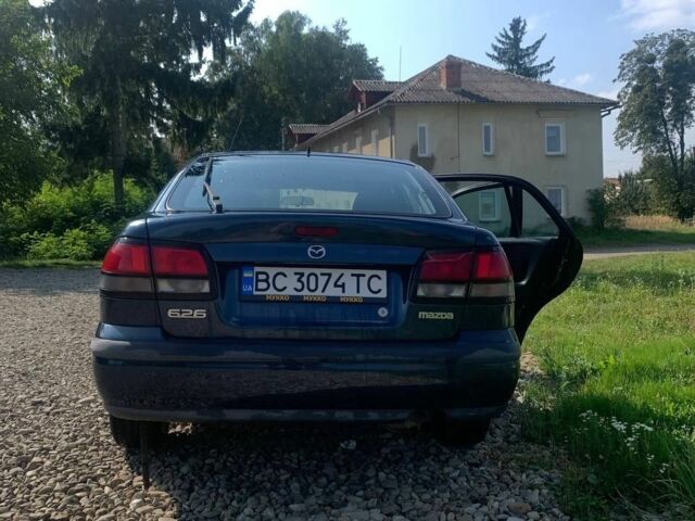 Синий Мазда 626, объемом двигателя 2 л и пробегом 251 тыс. км за 2500 $, фото 6 на Automoto.ua