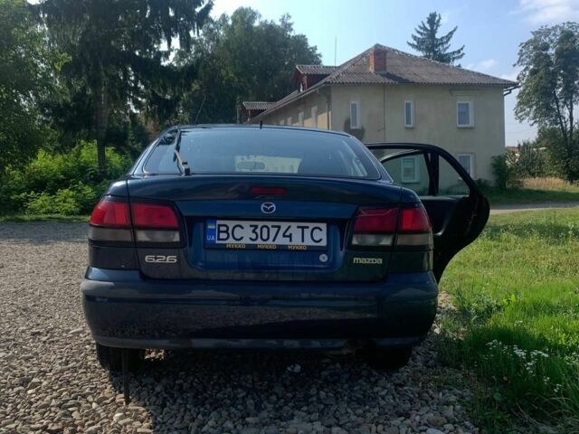 Синий Мазда 626, объемом двигателя 2 л и пробегом 251 тыс. км за 2500 $, фото 4 на Automoto.ua
