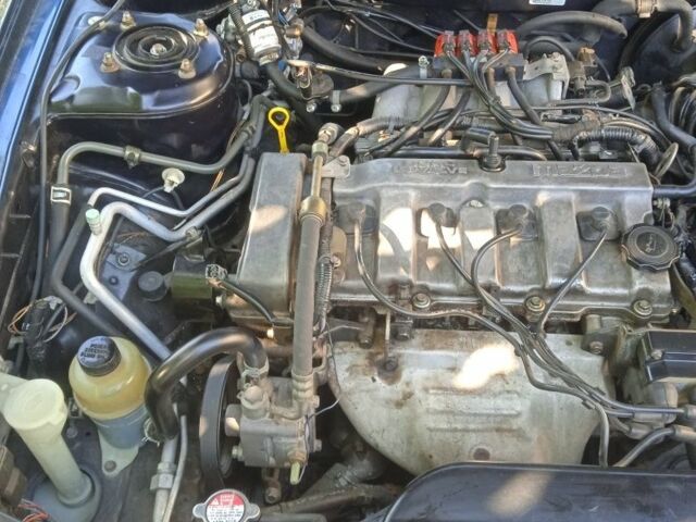 Синий Мазда 626, объемом двигателя 2 л и пробегом 251 тыс. км за 2500 $, фото 16 на Automoto.ua