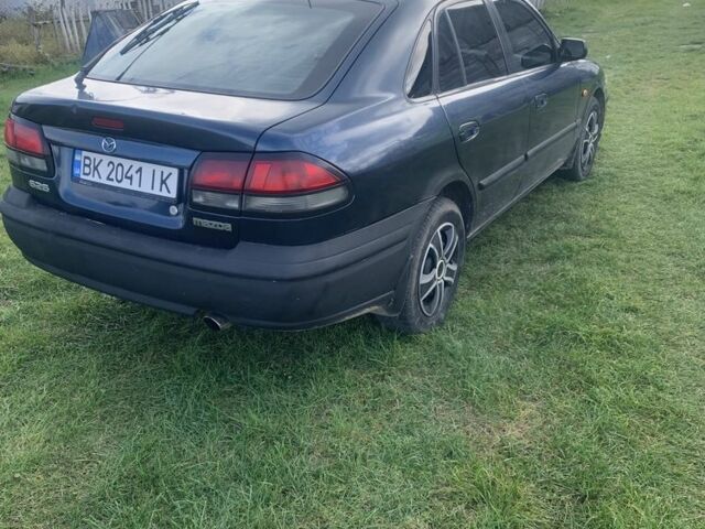 Синий Мазда 626, объемом двигателя 2 л и пробегом 3 тыс. км за 1900 $, фото 5 на Automoto.ua