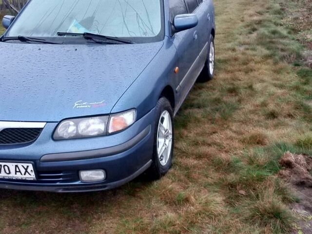 Синий Мазда 626, объемом двигателя 2 л и пробегом 231 тыс. км за 2500 $, фото 2 на Automoto.ua