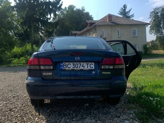 Синий Мазда 626, объемом двигателя 2 л и пробегом 251 тыс. км за 2500 $, фото 1 на Automoto.ua