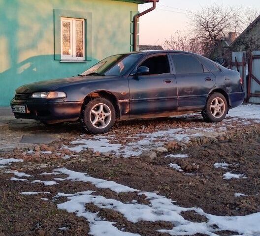 Синій Мазда 626, об'ємом двигуна 1.8 л та пробігом 430 тис. км за 800 $, фото 1 на Automoto.ua