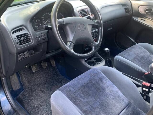 Синий Мазда 626, объемом двигателя 2 л и пробегом 251 тыс. км за 2500 $, фото 10 на Automoto.ua