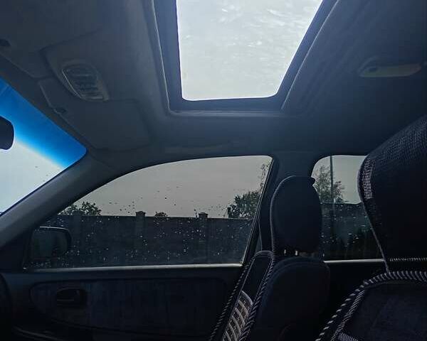 Синій Мазда 626, об'ємом двигуна 2 л та пробігом 440 тис. км за 1950 $, фото 9 на Automoto.ua