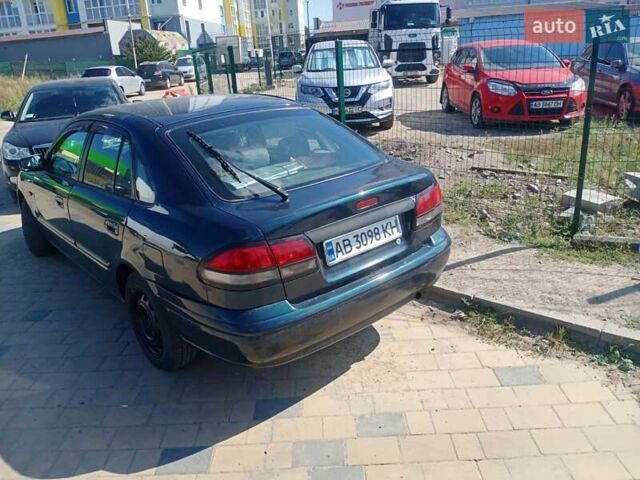 Синий Мазда 626, объемом двигателя 2 л и пробегом 450 тыс. км за 2500 $, фото 1 на Automoto.ua