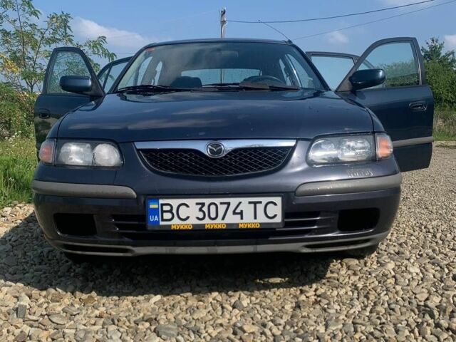 Синий Мазда 626, объемом двигателя 2 л и пробегом 251 тыс. км за 2500 $, фото 2 на Automoto.ua