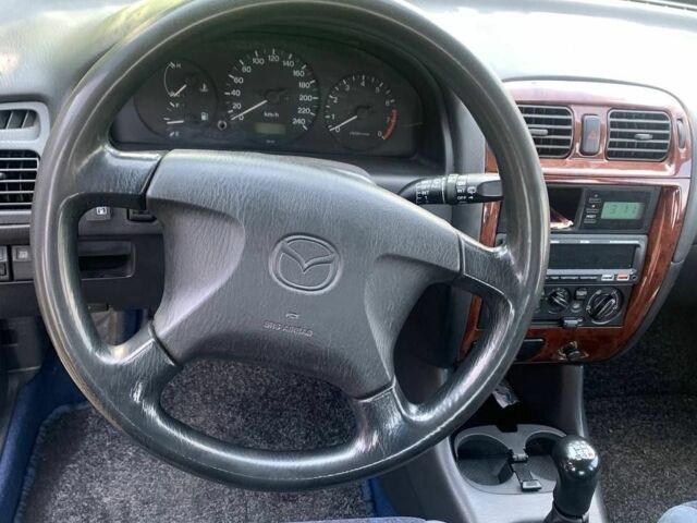 Синий Мазда 626, объемом двигателя 2 л и пробегом 251 тыс. км за 2500 $, фото 11 на Automoto.ua