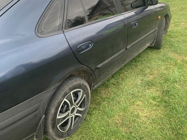 Синий Мазда 626, объемом двигателя 2 л и пробегом 3 тыс. км за 1900 $, фото 2 на Automoto.ua