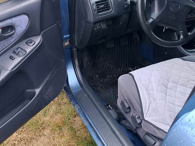 Синий Мазда 626, объемом двигателя 2 л и пробегом 231 тыс. км за 2500 $, фото 3 на Automoto.ua