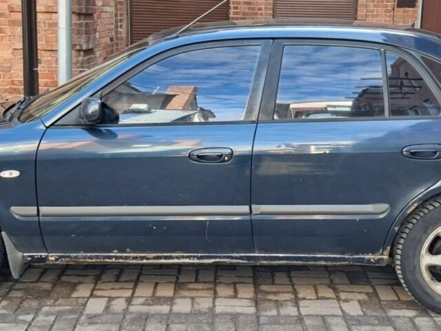 Синий Мазда 626, объемом двигателя 2 л и пробегом 572 тыс. км за 2500 $, фото 3 на Automoto.ua