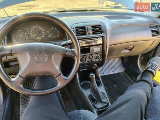 Синій Мазда 626, об'ємом двигуна 2 л та пробігом 288 тис. км за 3300 $, фото 7 на Automoto.ua