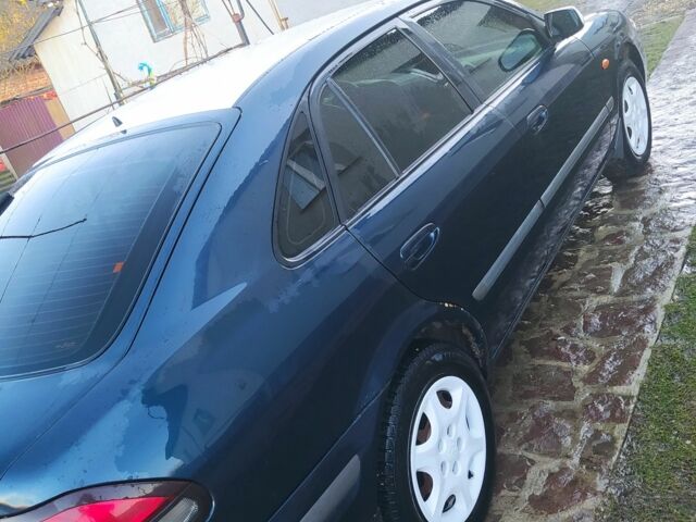 Синій Мазда 626, об'ємом двигуна 2 л та пробігом 280 тис. км за 2250 $, фото 4 на Automoto.ua