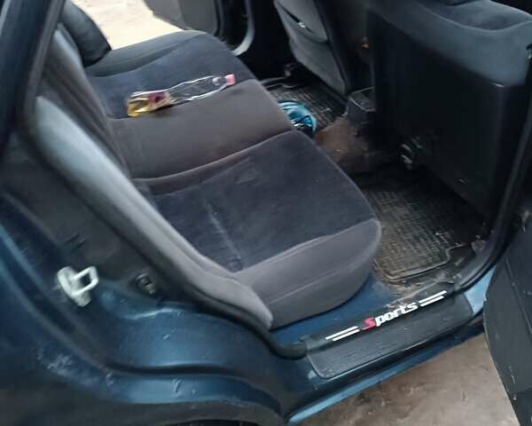 Синий Мазда 626, объемом двигателя 2 л и пробегом 280 тыс. км за 2000 $, фото 20 на Automoto.ua