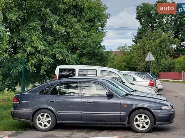 Синій Мазда 626, об'ємом двигуна 2 л та пробігом 288 тис. км за 3300 $, фото 14 на Automoto.ua