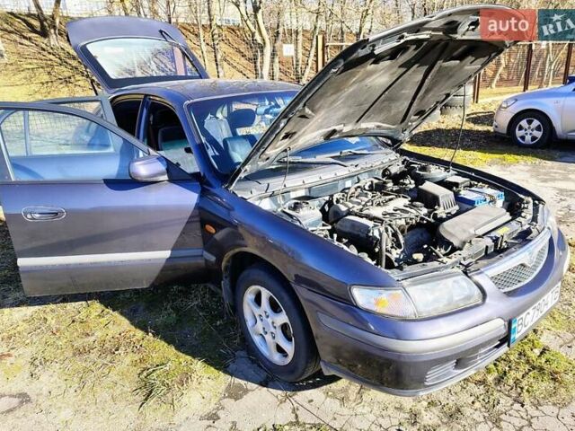 Синій Мазда 626, об'ємом двигуна 2 л та пробігом 288 тис. км за 3300 $, фото 5 на Automoto.ua