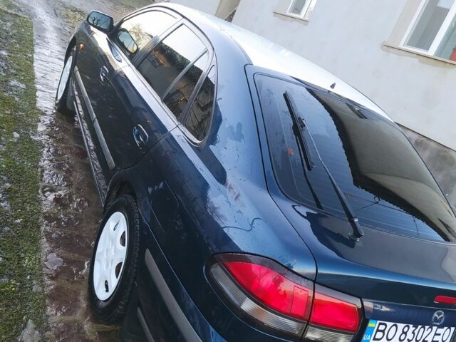 Синій Мазда 626, об'ємом двигуна 2 л та пробігом 280 тис. км за 2250 $, фото 6 на Automoto.ua