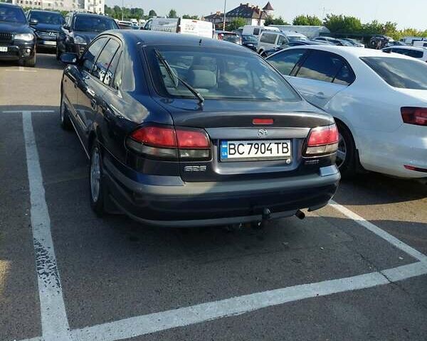 Синій Мазда 626, об'ємом двигуна 2 л та пробігом 288 тис. км за 3300 $, фото 13 на Automoto.ua