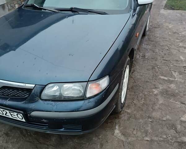 Синий Мазда 626, объемом двигателя 2 л и пробегом 280 тыс. км за 2000 $, фото 2 на Automoto.ua