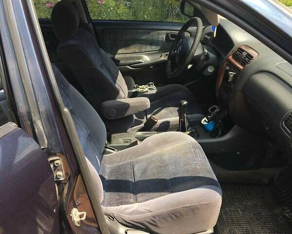 Синий Мазда 626, объемом двигателя 1.99 л и пробегом 314 тыс. км за 3300 $, фото 6 на Automoto.ua