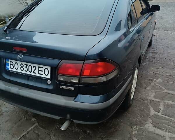 Синий Мазда 626, объемом двигателя 2 л и пробегом 280 тыс. км за 2000 $, фото 9 на Automoto.ua