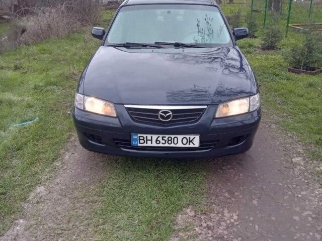 Синій Мазда 626, об'ємом двигуна 2 л та пробігом 320 тис. км за 2800 $, фото 11 на Automoto.ua