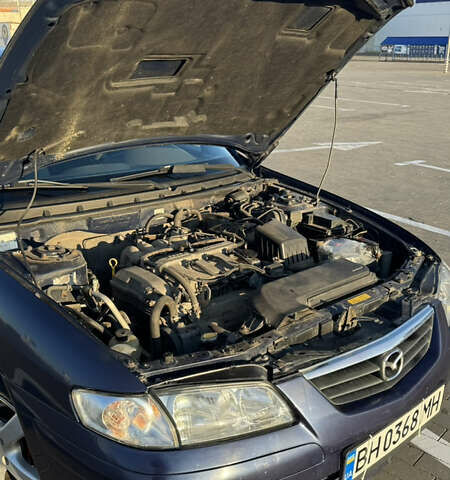 Синій Мазда 626, об'ємом двигуна 1.99 л та пробігом 231 тис. км за 3500 $, фото 27 на Automoto.ua