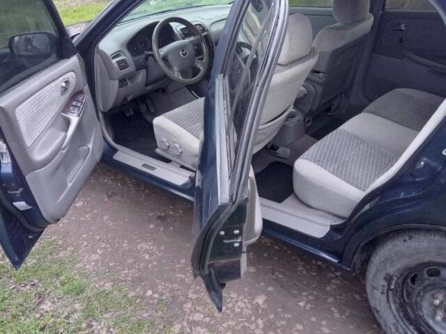 Синий Мазда 626, объемом двигателя 2 л и пробегом 320 тыс. км за 2800 $, фото 4 на Automoto.ua
