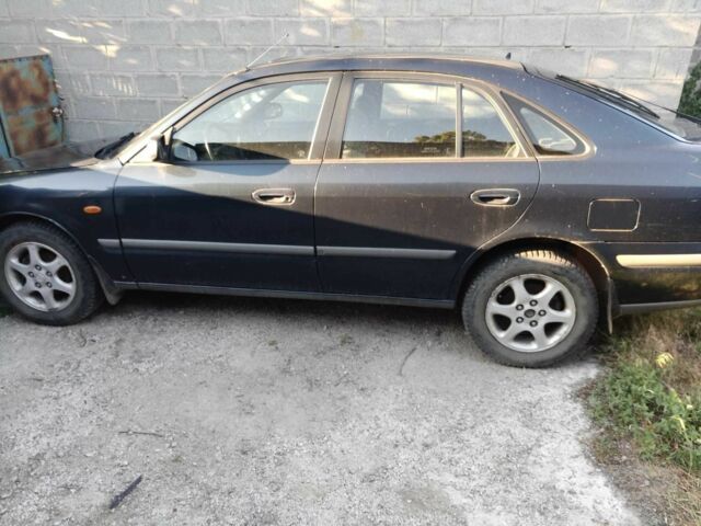 Синий Мазда 626, объемом двигателя 2 л и пробегом 260 тыс. км за 2992 $, фото 2 на Automoto.ua