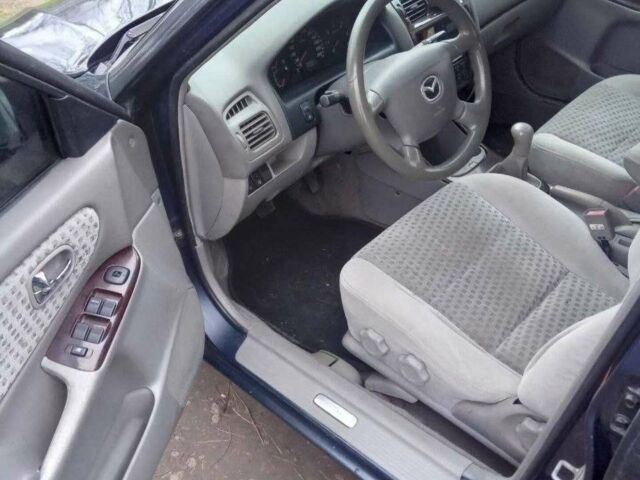 Синий Мазда 626, объемом двигателя 2 л и пробегом 320 тыс. км за 2800 $, фото 8 на Automoto.ua