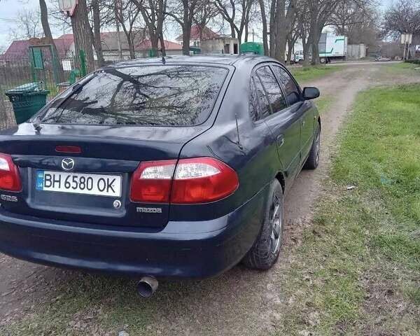 Синій Мазда 626, об'ємом двигуна 2 л та пробігом 320 тис. км за 2700 $, фото 1 на Automoto.ua