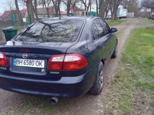 Синій Мазда 626, об'ємом двигуна 2 л та пробігом 320 тис. км за 2800 $, фото 1 на Automoto.ua