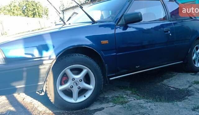 Синий Мазда 626, объемом двигателя 2 л и пробегом 370 тыс. км за 950 $, фото 8 на Automoto.ua