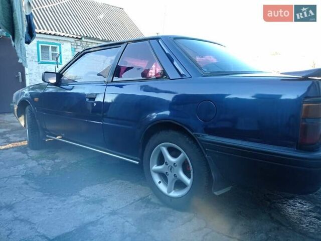 Синий Мазда 626, объемом двигателя 2 л и пробегом 370 тыс. км за 950 $, фото 1 на Automoto.ua