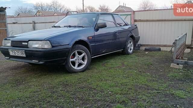 Синий Мазда 626, объемом двигателя 2 л и пробегом 370 тыс. км за 950 $, фото 2 на Automoto.ua