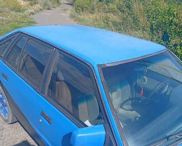 Синій Мазда 626, об'ємом двигуна 1.6 л та пробігом 65 тис. км за 600 $, фото 10 на Automoto.ua