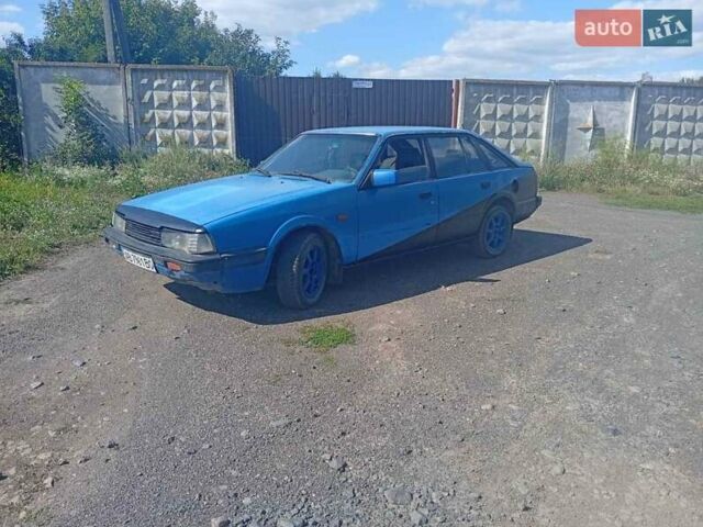 Синій Мазда 626, об'ємом двигуна 1.6 л та пробігом 65 тис. км за 600 $, фото 8 на Automoto.ua