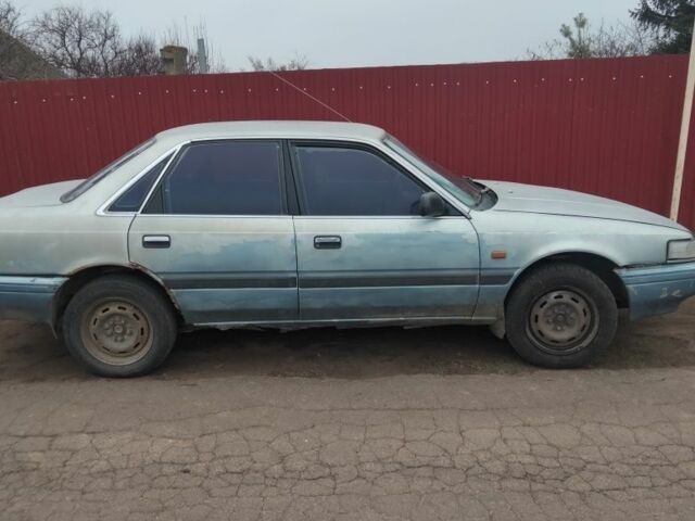 Синий Мазда 626, объемом двигателя 0 л и пробегом 400 тыс. км за 700 $, фото 1 на Automoto.ua