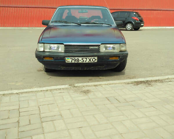 Синий Мазда 626, объемом двигателя 2 л и пробегом 1 тыс. км за 1500 $, фото 3 на Automoto.ua