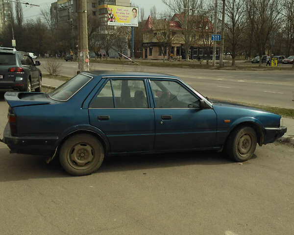 Синий Мазда 626, объемом двигателя 2 л и пробегом 1 тыс. км за 1500 $, фото 1 на Automoto.ua