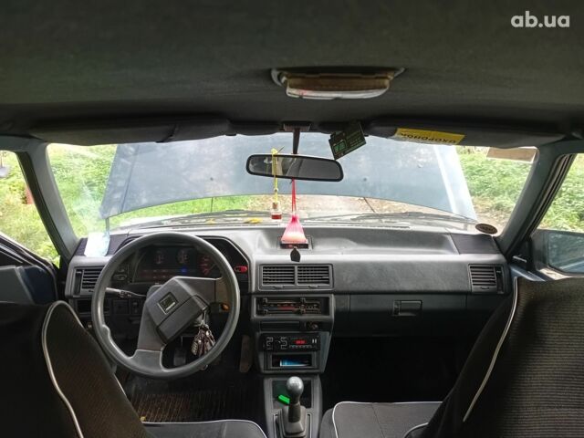 Синий Мазда 626, объемом двигателя 2 л и пробегом 387 тыс. км за 1500 $, фото 5 на Automoto.ua