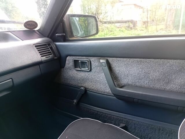 Синий Мазда 626, объемом двигателя 2 л и пробегом 387 тыс. км за 1500 $, фото 2 на Automoto.ua