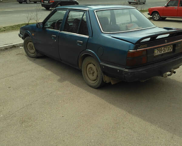 Синий Мазда 626, объемом двигателя 2 л и пробегом 1 тыс. км за 1500 $, фото 4 на Automoto.ua