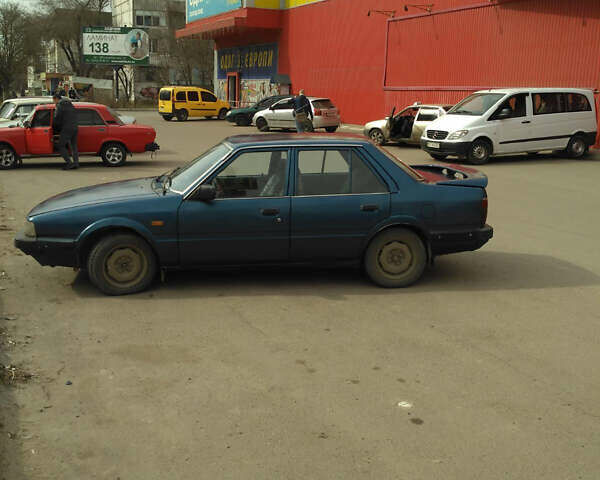 Синий Мазда 626, объемом двигателя 2 л и пробегом 1 тыс. км за 1500 $, фото 5 на Automoto.ua