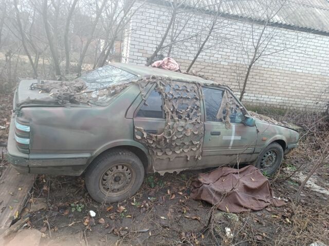 Синій Мазда 626, об'ємом двигуна 2 л та пробігом 100 тис. км за 356 $, фото 6 на Automoto.ua