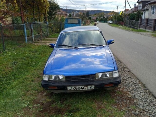 Синий Мазда 626, объемом двигателя 2 л и пробегом 1000 тыс. км за 400 $, фото 2 на Automoto.ua