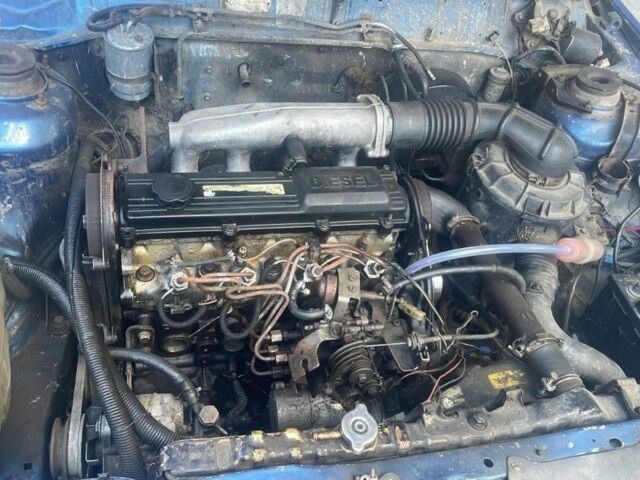 Синий Мазда 626, объемом двигателя 2 л и пробегом 1000 тыс. км за 400 $, фото 4 на Automoto.ua