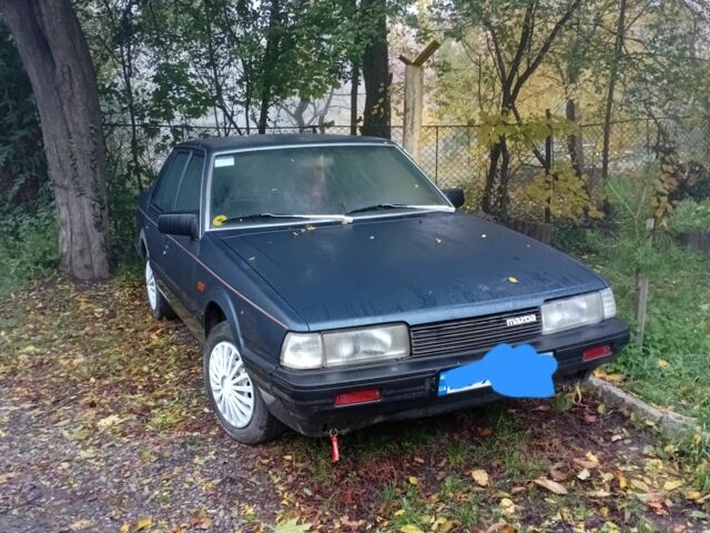 Синий Мазда 626, объемом двигателя 2 л и пробегом 387 тыс. км за 1500 $, фото 1 на Automoto.ua