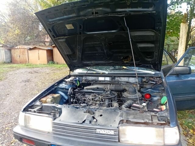 Синий Мазда 626, объемом двигателя 2 л и пробегом 387 тыс. км за 1500 $, фото 11 на Automoto.ua
